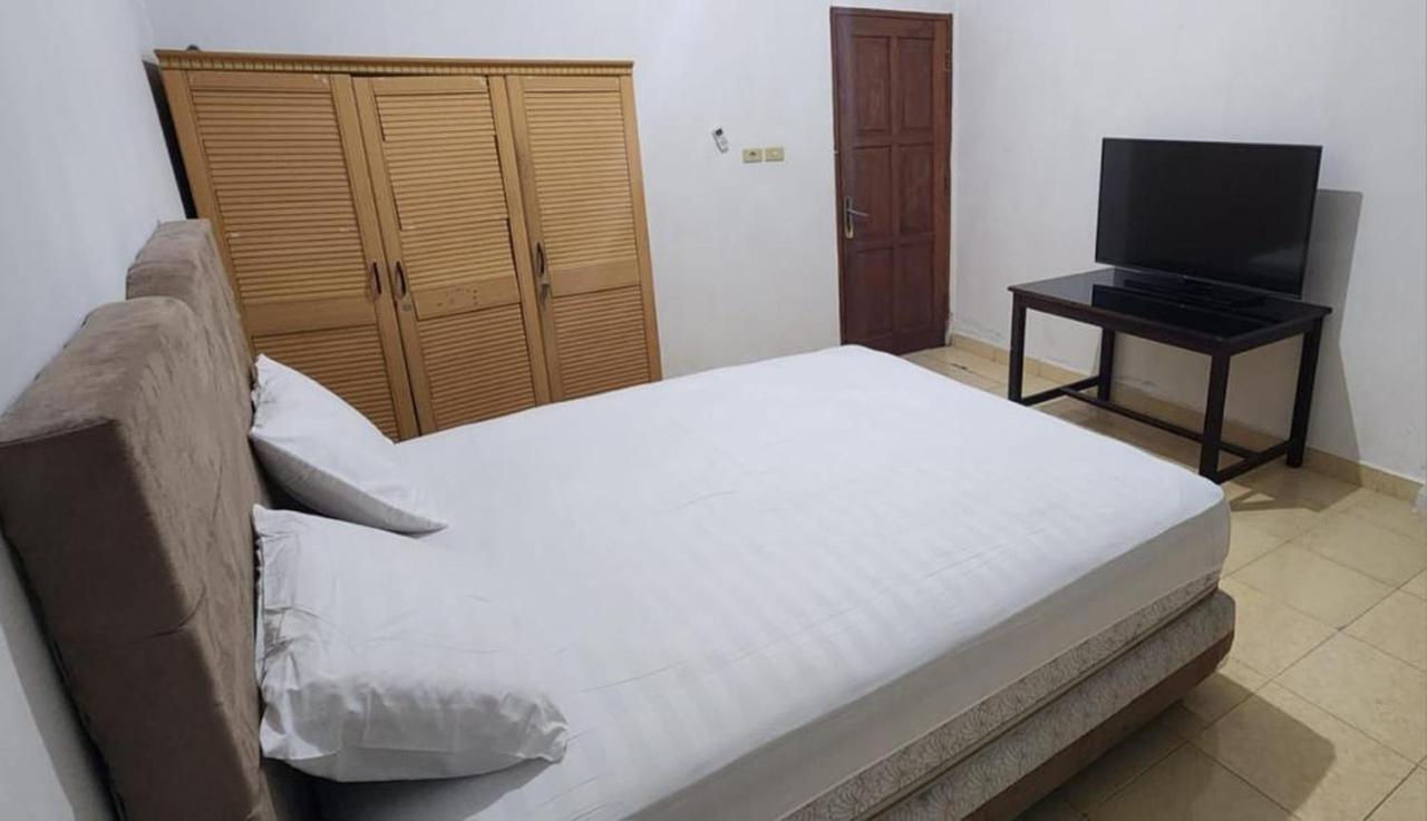 Permata Homestay Kotamobagu Mitra Reddoorz Extérieur photo