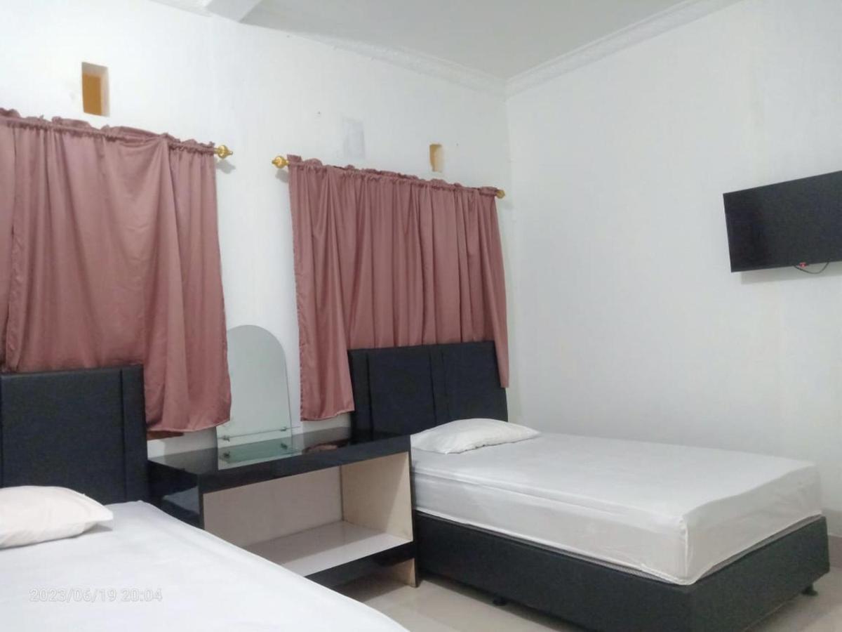 Permata Homestay Kotamobagu Mitra Reddoorz Extérieur photo