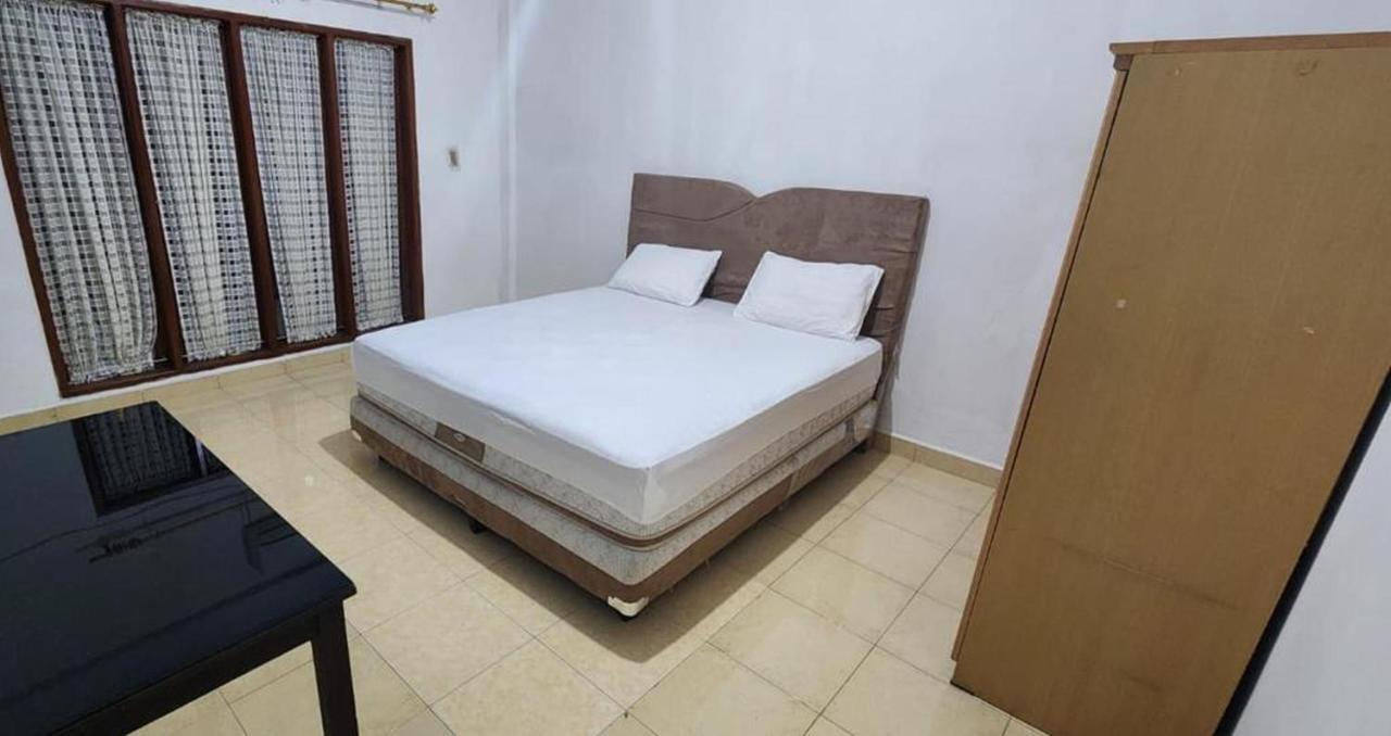 Permata Homestay Kotamobagu Mitra Reddoorz Extérieur photo