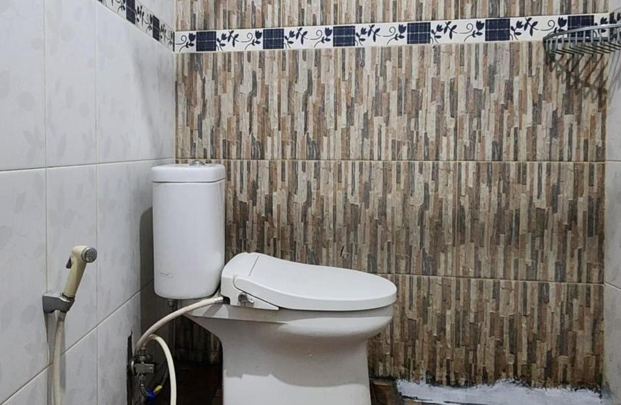 Permata Homestay Kotamobagu Mitra Reddoorz Extérieur photo